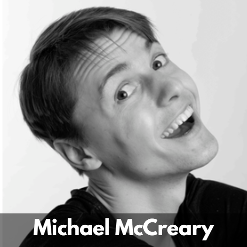 A black and white photo shows Michael McCreary, a white man in his 20s, giving a cheeky grin. He wears a dark shirt.